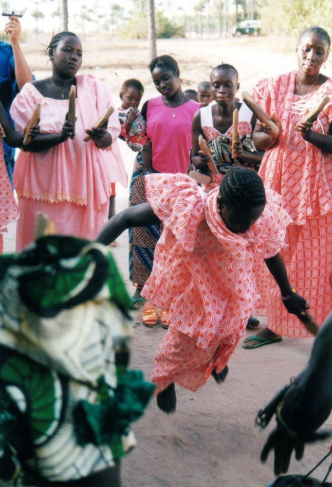 Jola women dancing bukarabo during circumcission ceremony